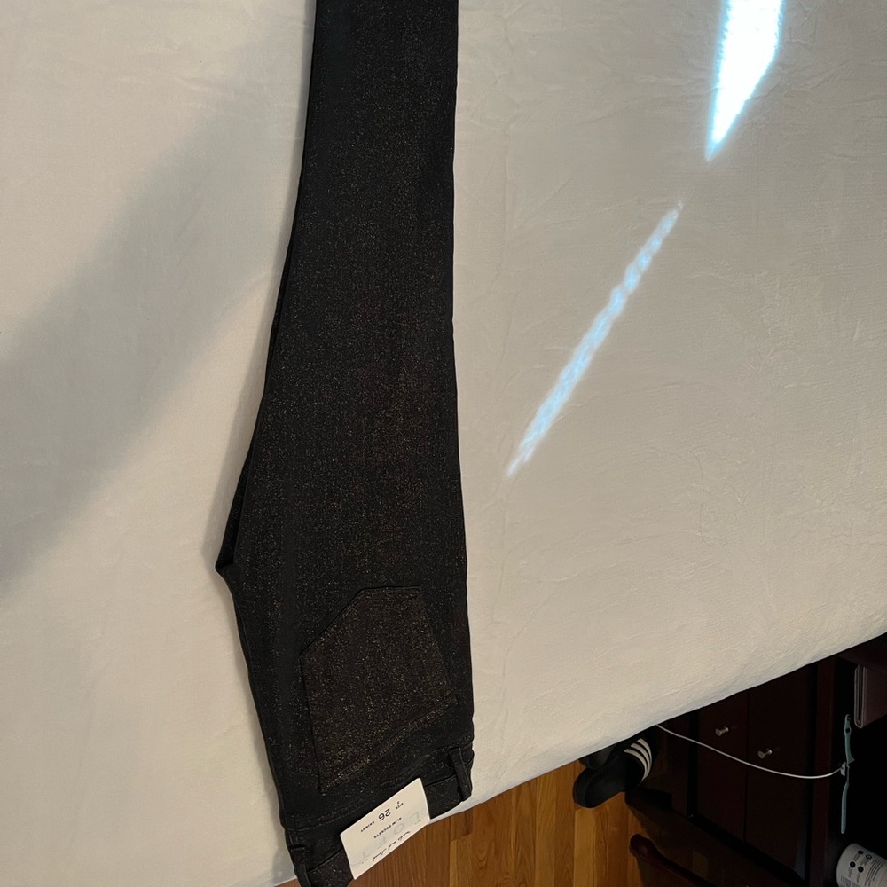 Loft skinny shimmer jeans new w tags. Black jeans w copper shimmer.